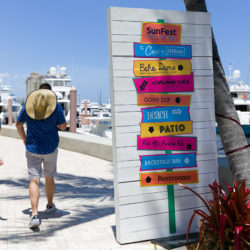cove signage with people